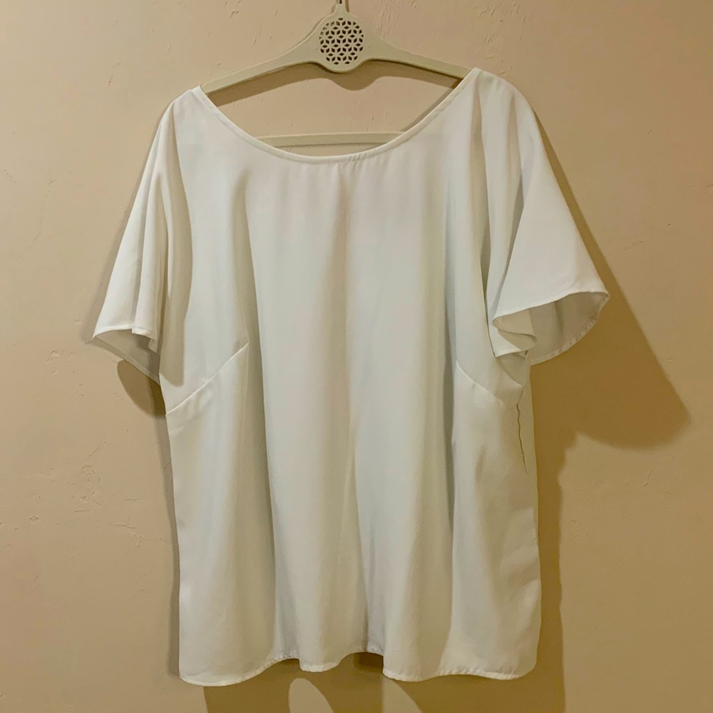 White professional top with butterfly back